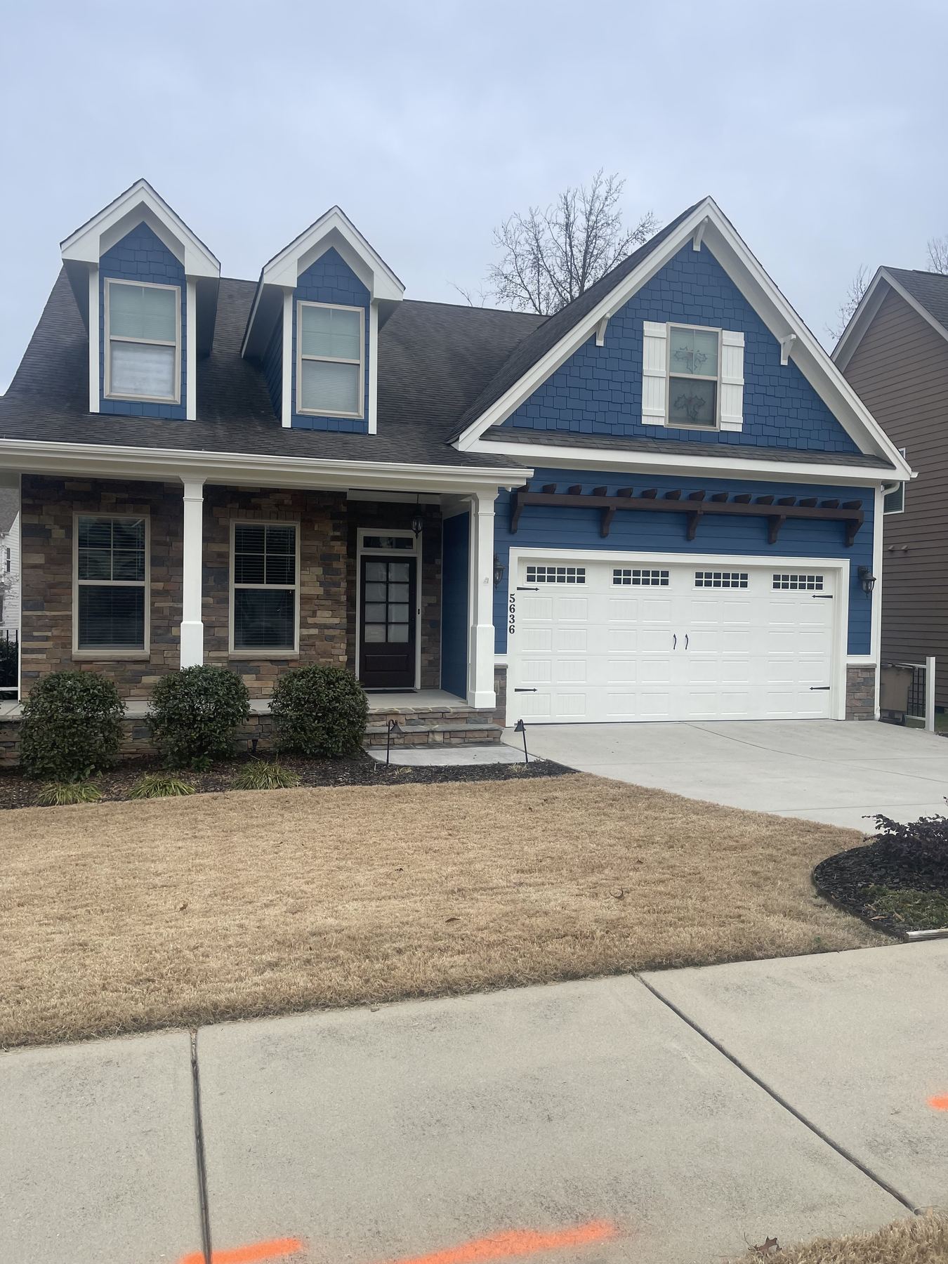 House painting services in Wendell NC with blue exterior and white trim
